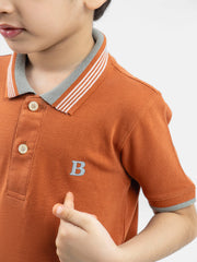 Rusty Orange Polo With Blue Collar