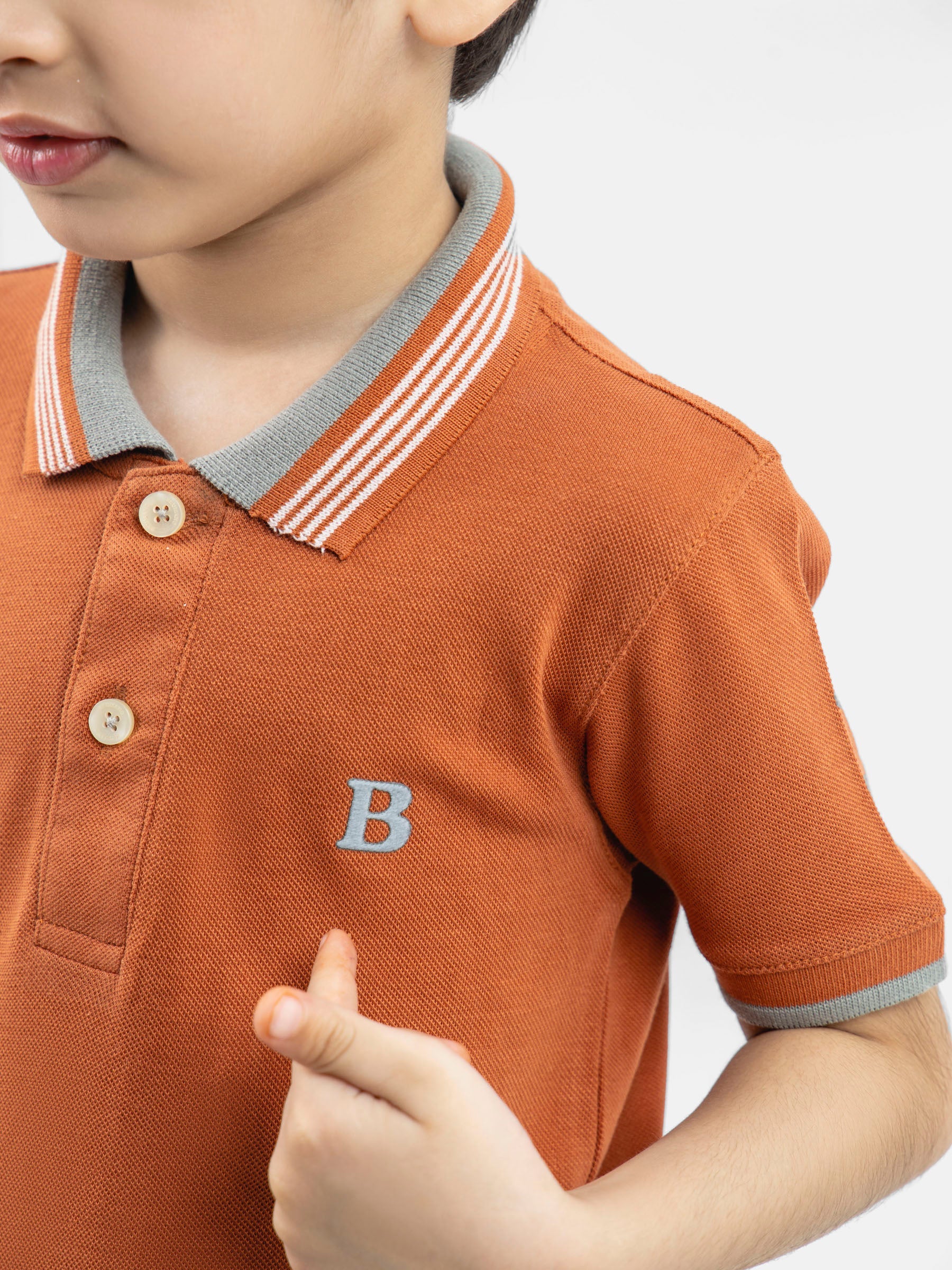 Rusty Orange Polo With Blue Collar